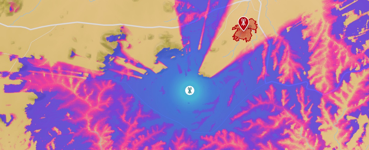 Coverage plot of a TV tower (blue/pink) and a TVWS device fitting into a gap (red)